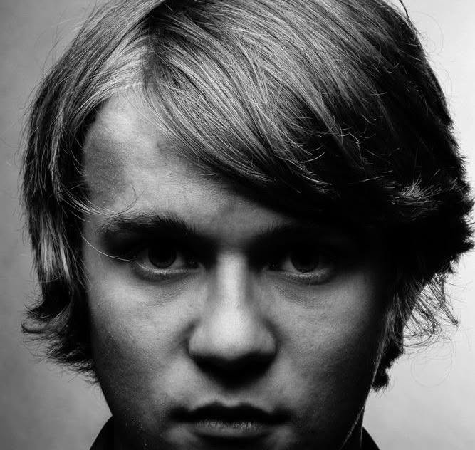 Black-and-white close-up portrait of Robert Midgett